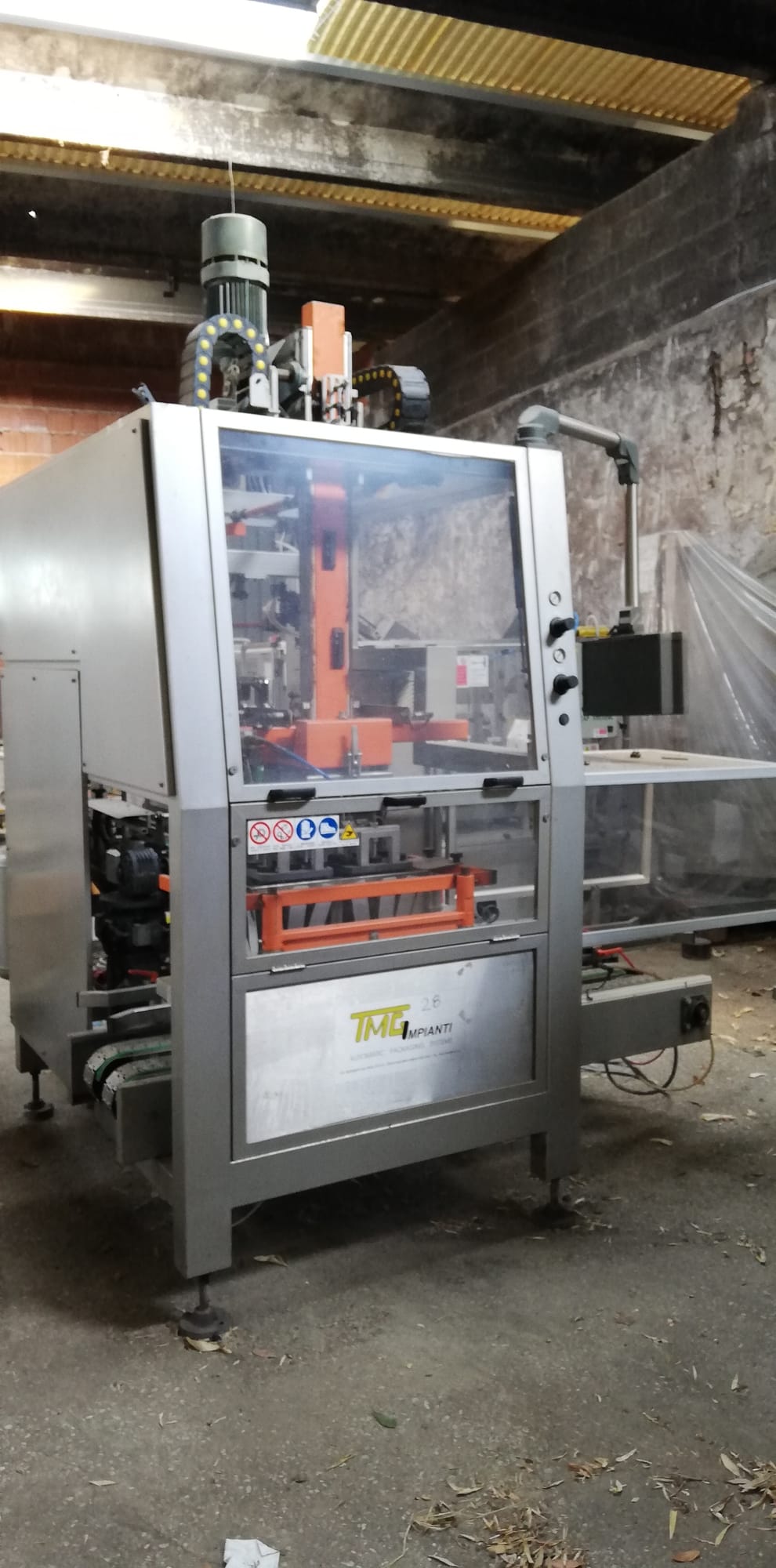 TMG case packer with mechanical axis motion
