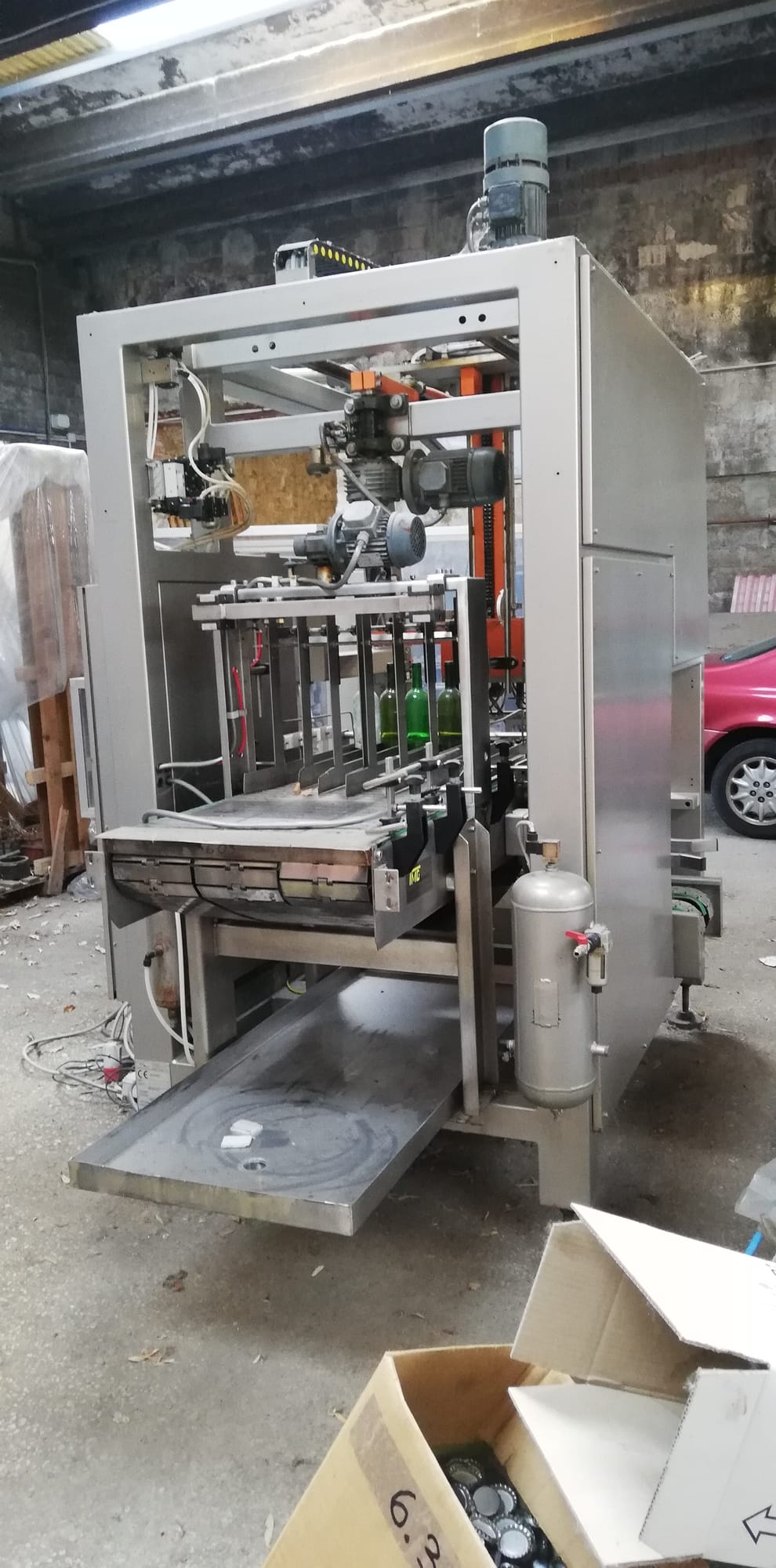TMG case packer with mechanical axis motion