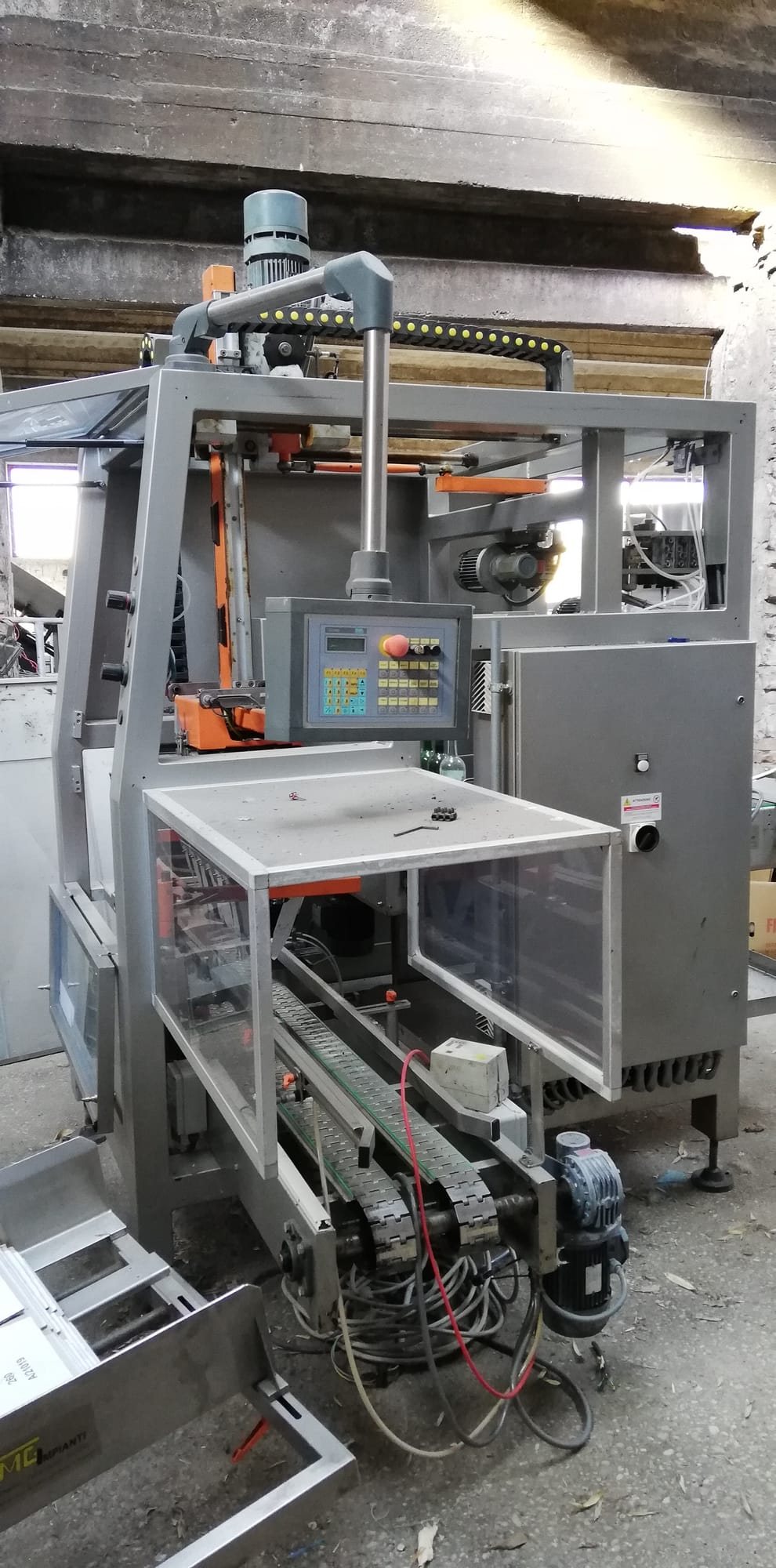 TMG case packer with mechanical axis motion