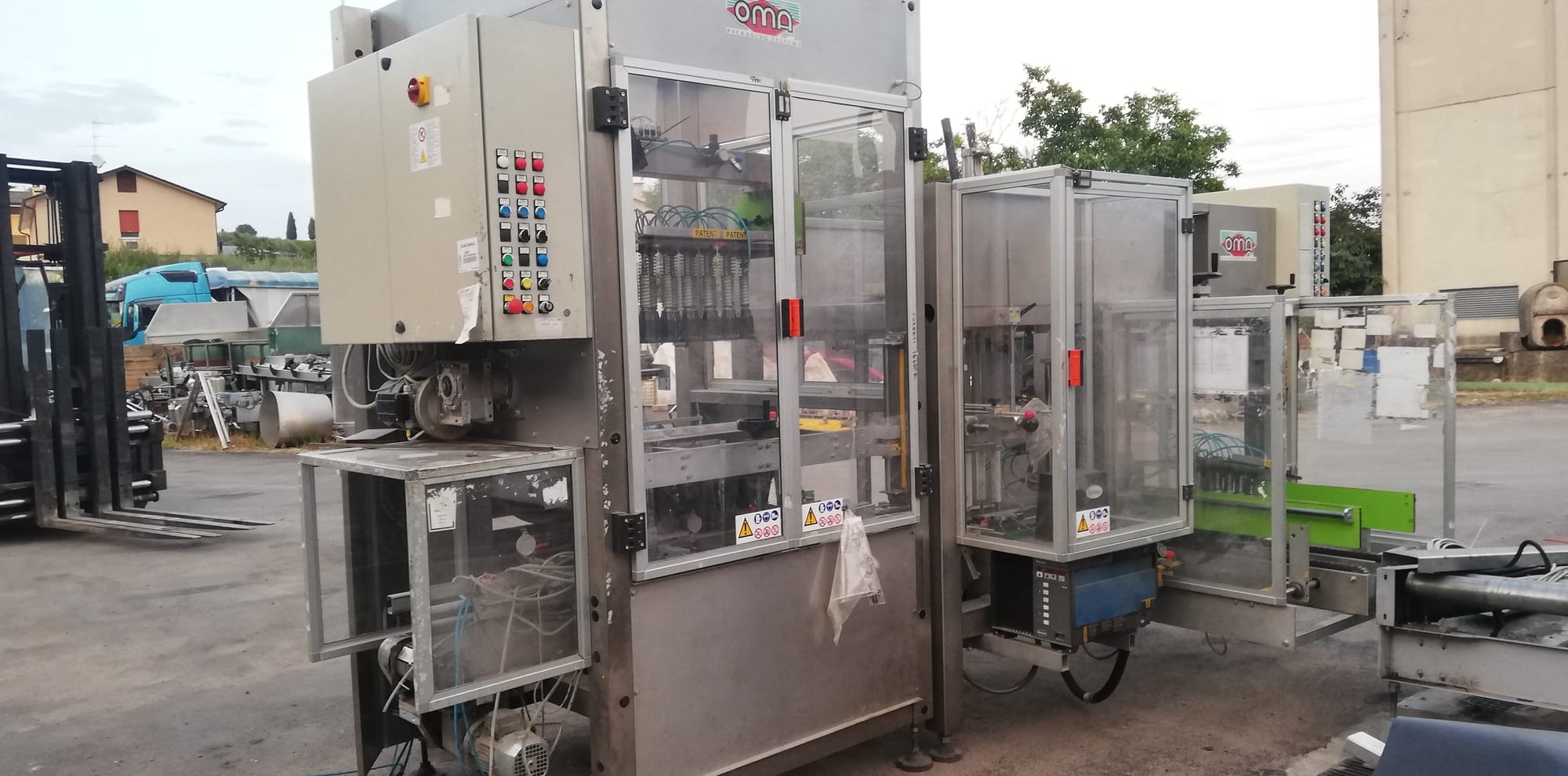 OMA case erector and case packer monobloc