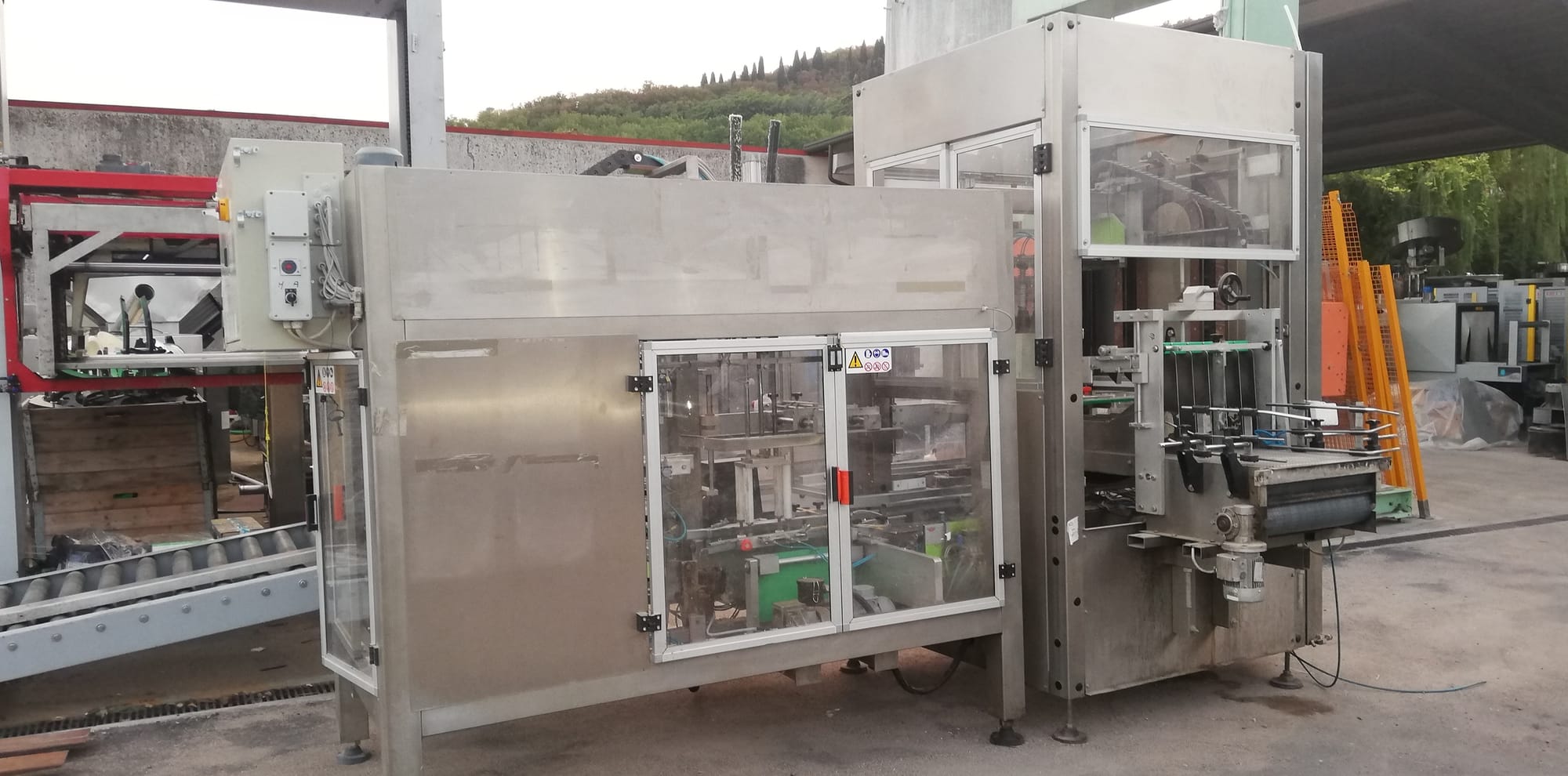 OMA case erector and case packer monobloc
