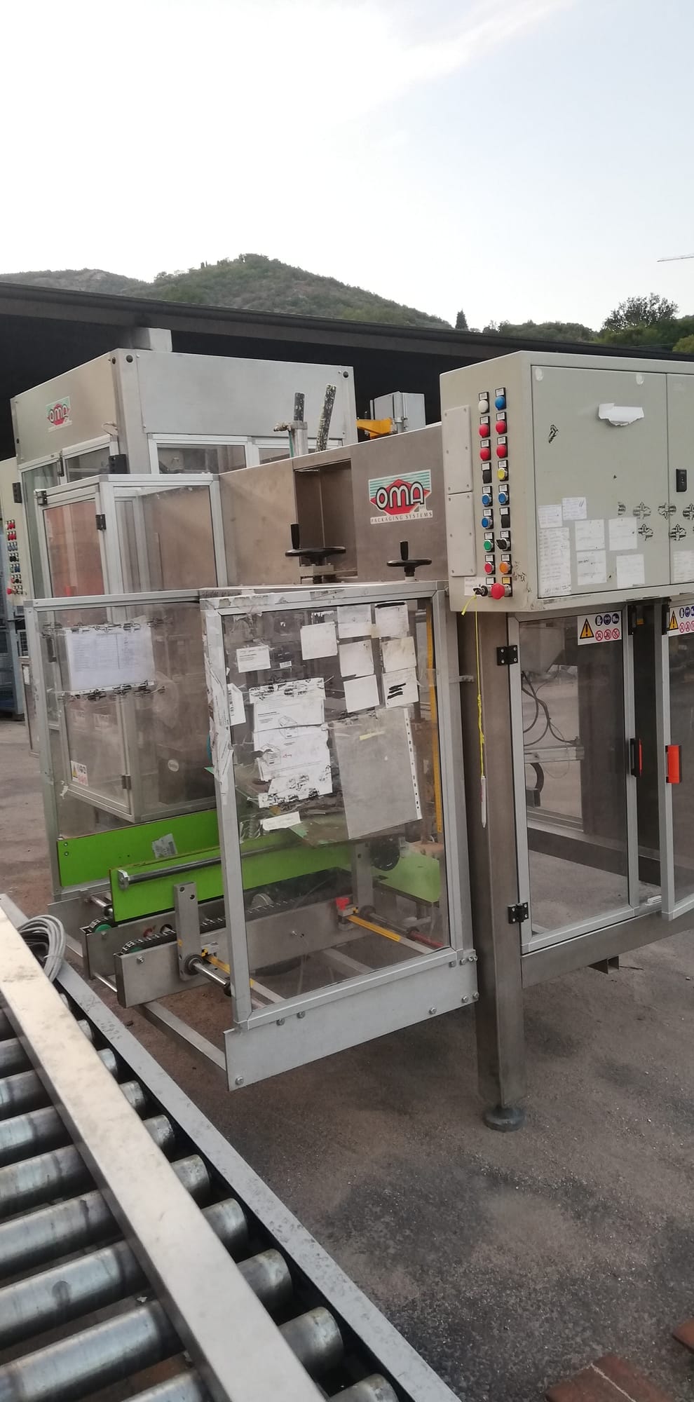 OMA case erector and case packer monobloc