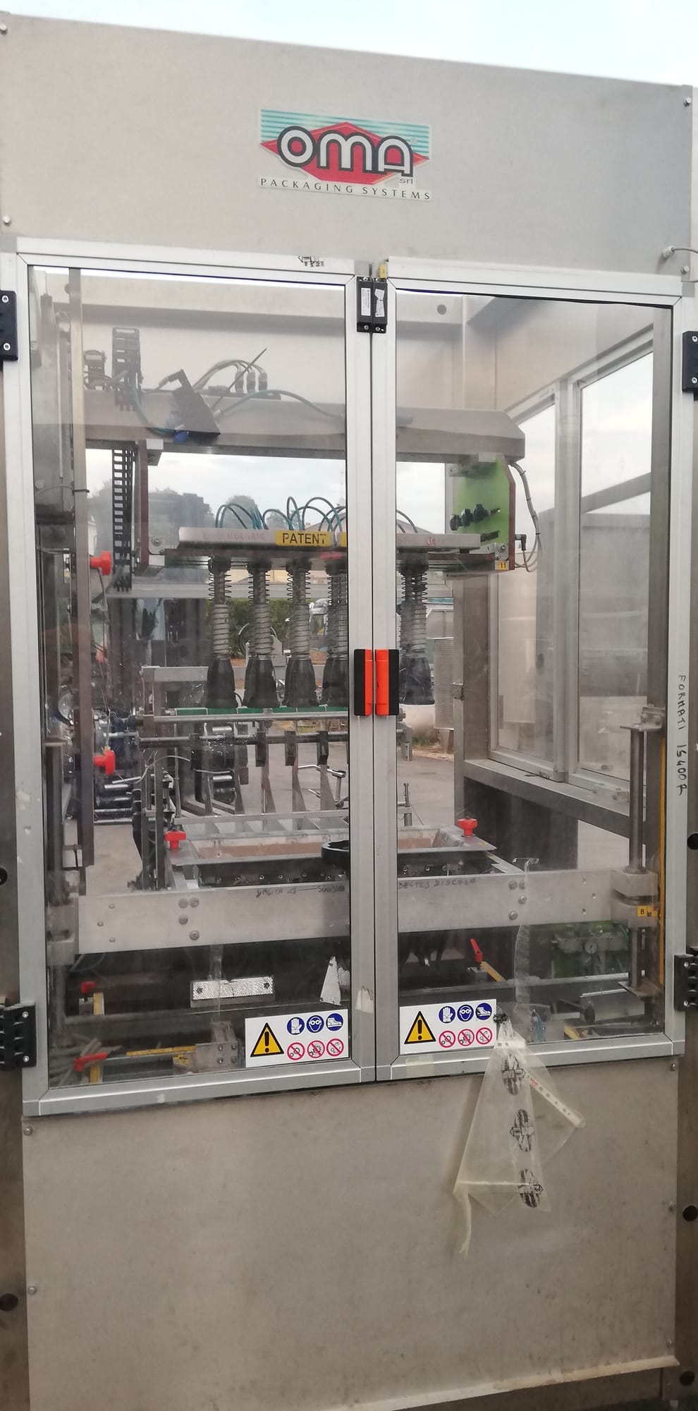 OMA case erector and case packer monobloc