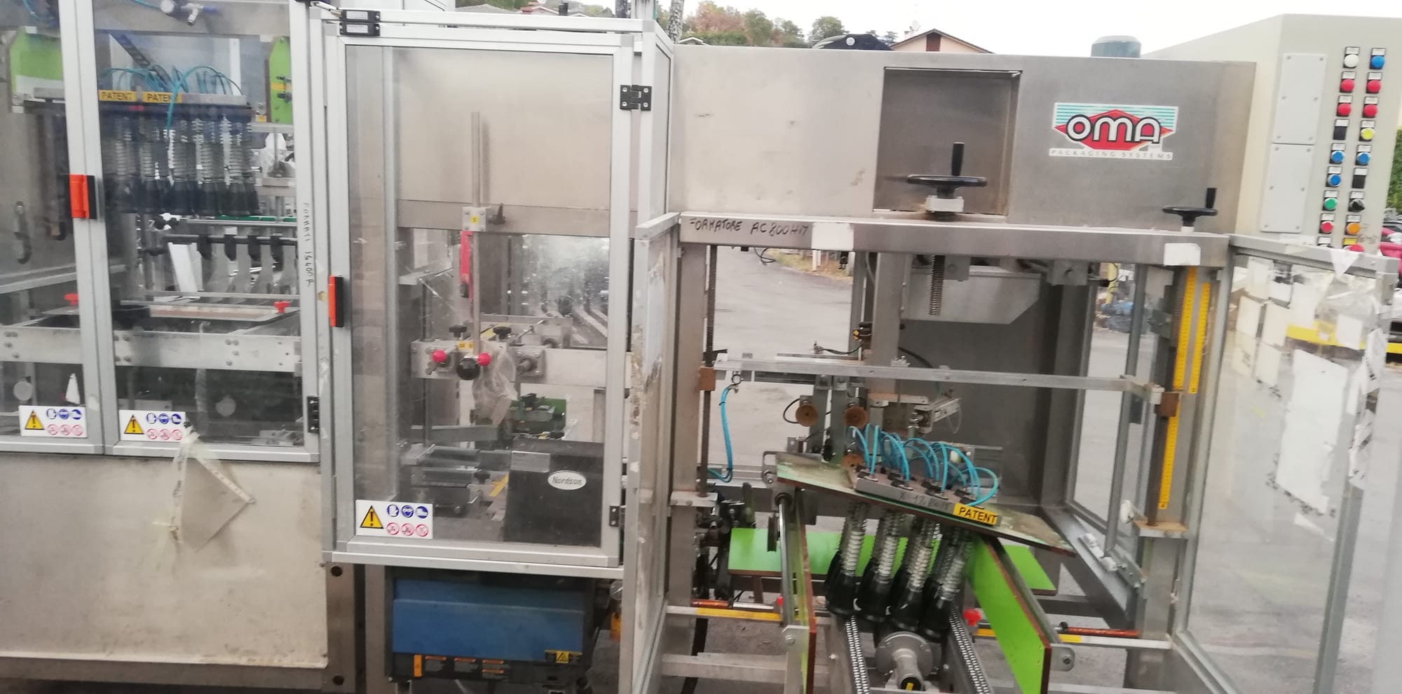 OMA case erector and case packer monobloc